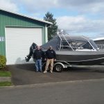 WhoDat Towers-Tim and Jim of Who Dat Towers with boat