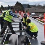 Guys installing panels Providence